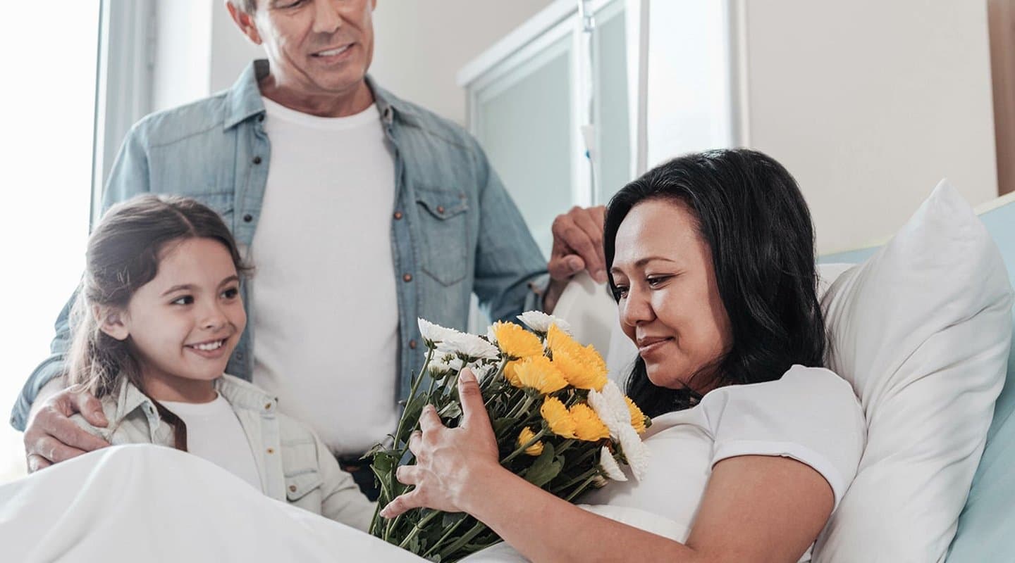 Family visits a patient in the medical center