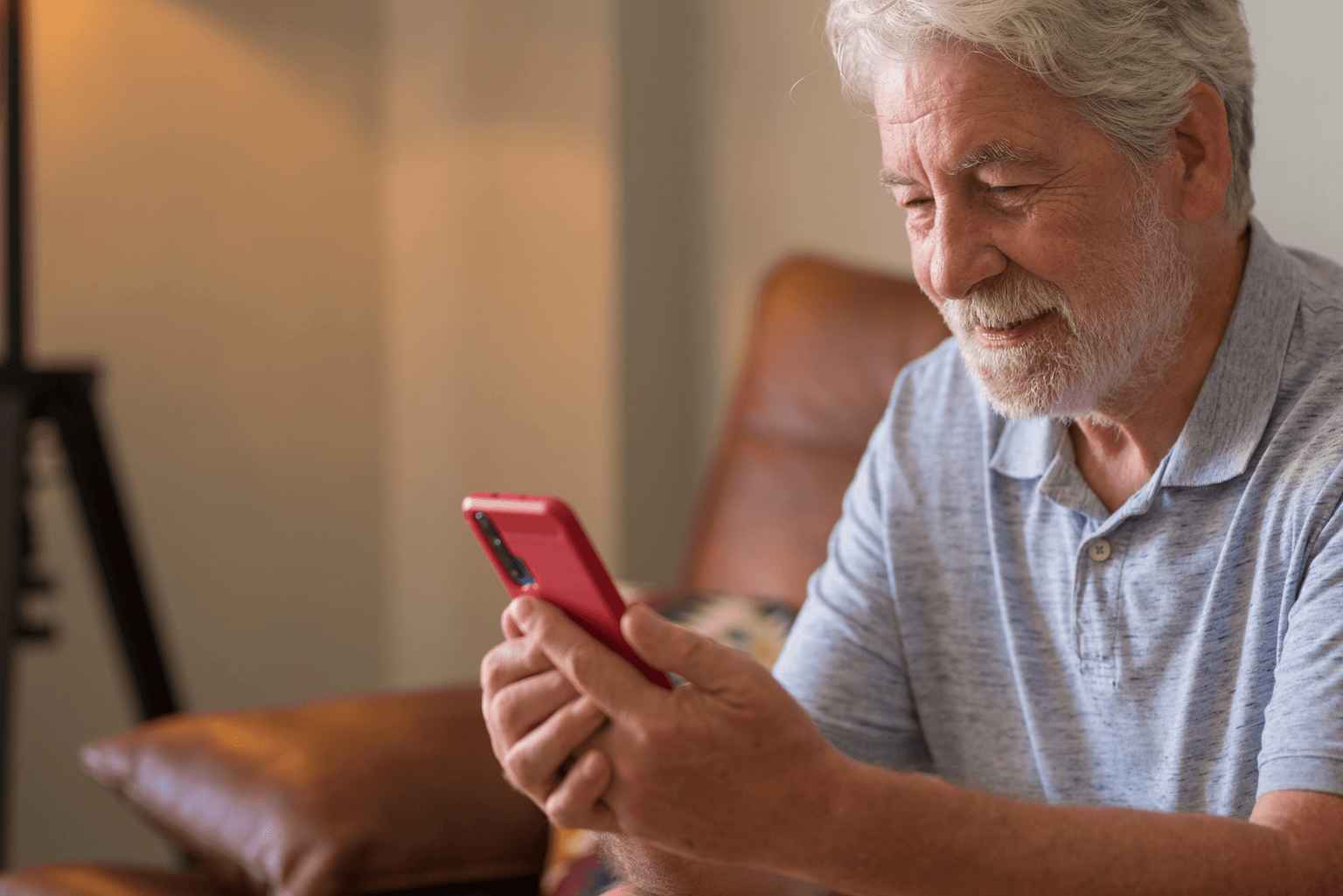 Older male using smartphone