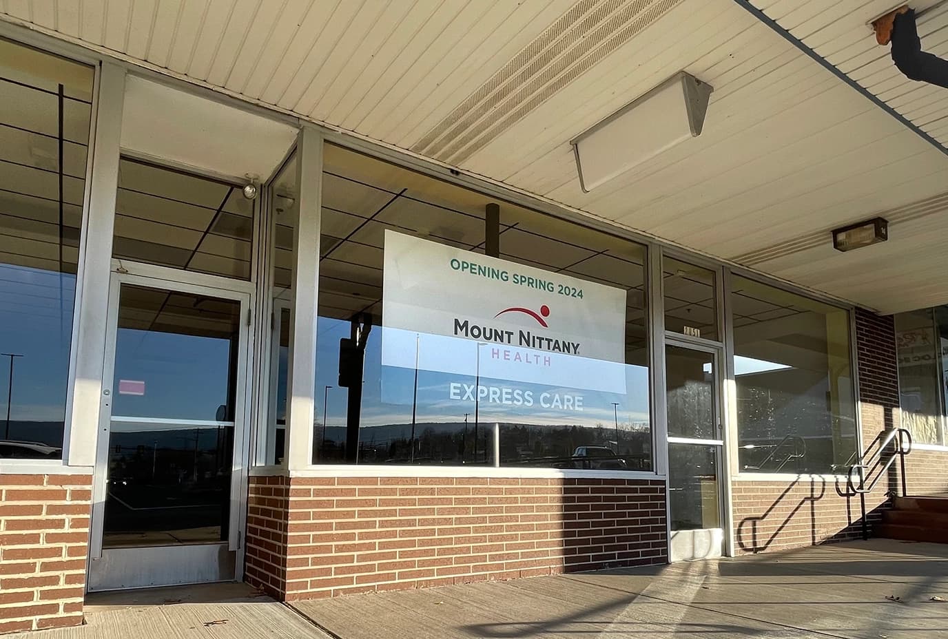 Front of the new location of Mount Nittany Health Express Care with a coming soon sign