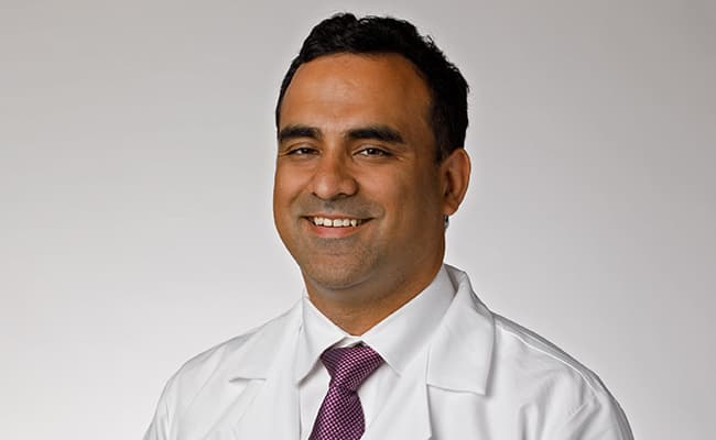 A headshot of hematologist-oncologist Dr. Abhishek Seth.