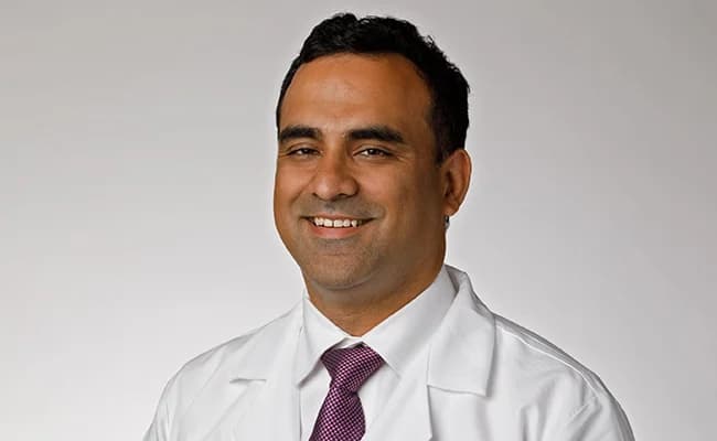 A headshot of hematologist-oncologist Dr. Abhishek Seth.
