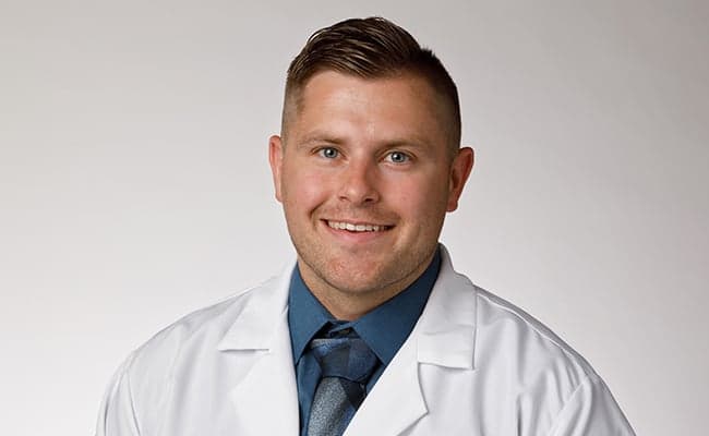 A headshot of orthopedic and sports medicine physician assistant, Joshua Gates.