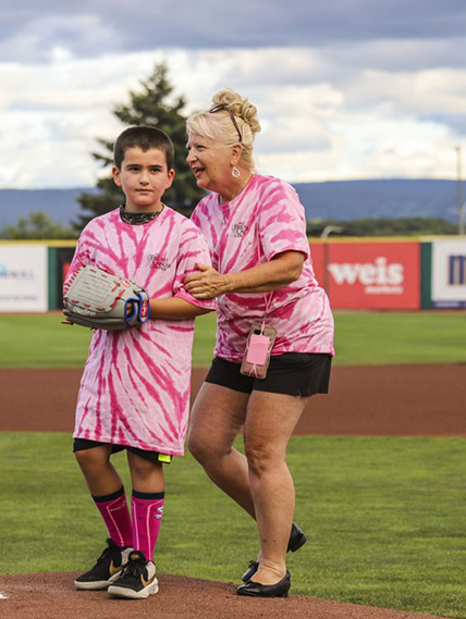 Throwing out the first pitch at Paint the Park Pink 2023