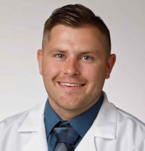 A headshot of orthopedic and sports medicine physician assistant, Joshua Gates.