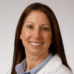 Julia Burton, CRNP poses for a professional headshot