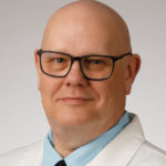 Lester Griel, CRNP smiles for a headshot photo