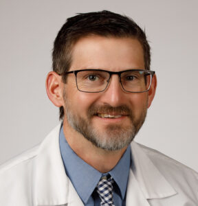 Ryan R. Ridenour, DO poses for a professional headshot