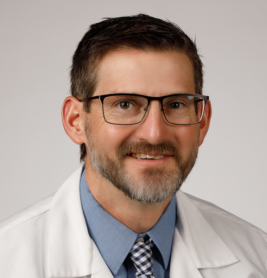 Ryan R. Ridenour, DO poses for a professional headshot