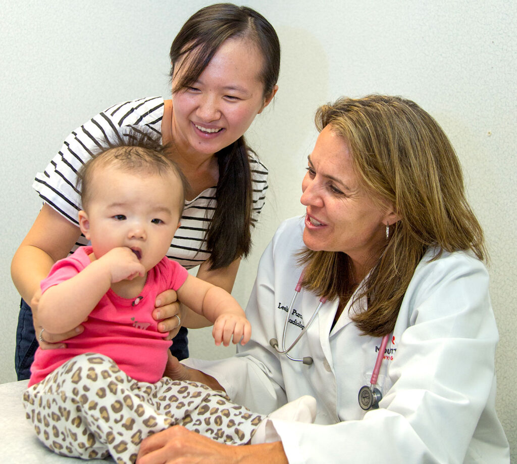 Pediatric provider examines a patient