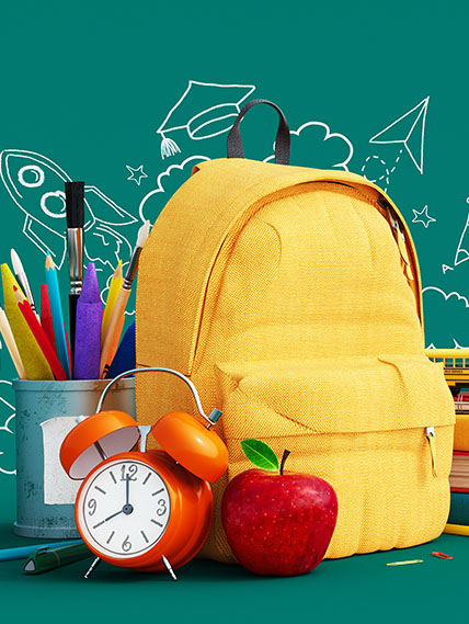 Yellow backpack and school supplies with a dark green background