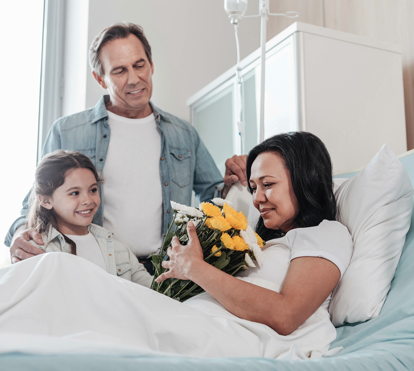 Family visits a patient in the medical center