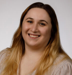 Elizabeth Grieggs smiles at the camera