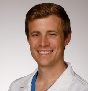 Kevin Anderson, PA-C smiles for a professional headshot photo