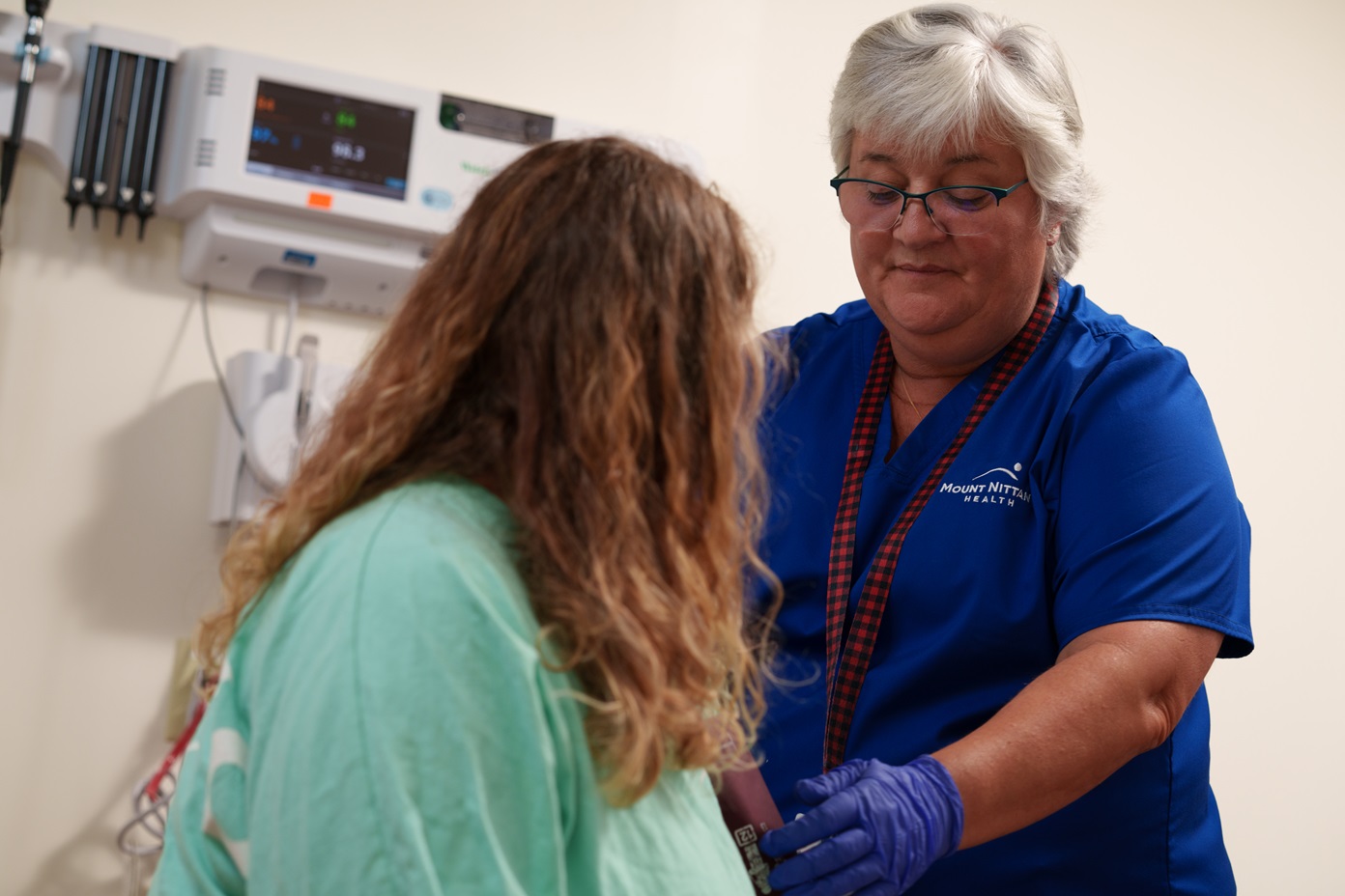 LPN working with a patient.