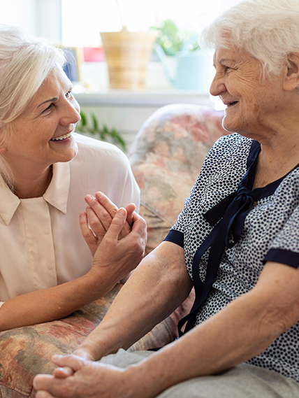 Caregiver at home with their parent.