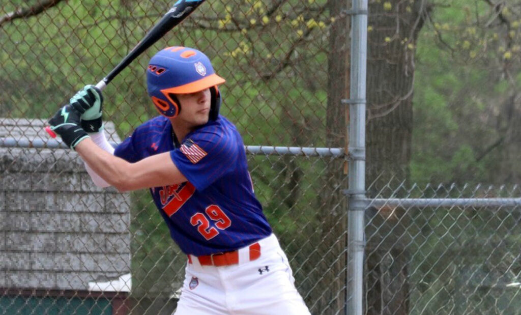 Cameron Guss is at homeplate read to hit a baseball