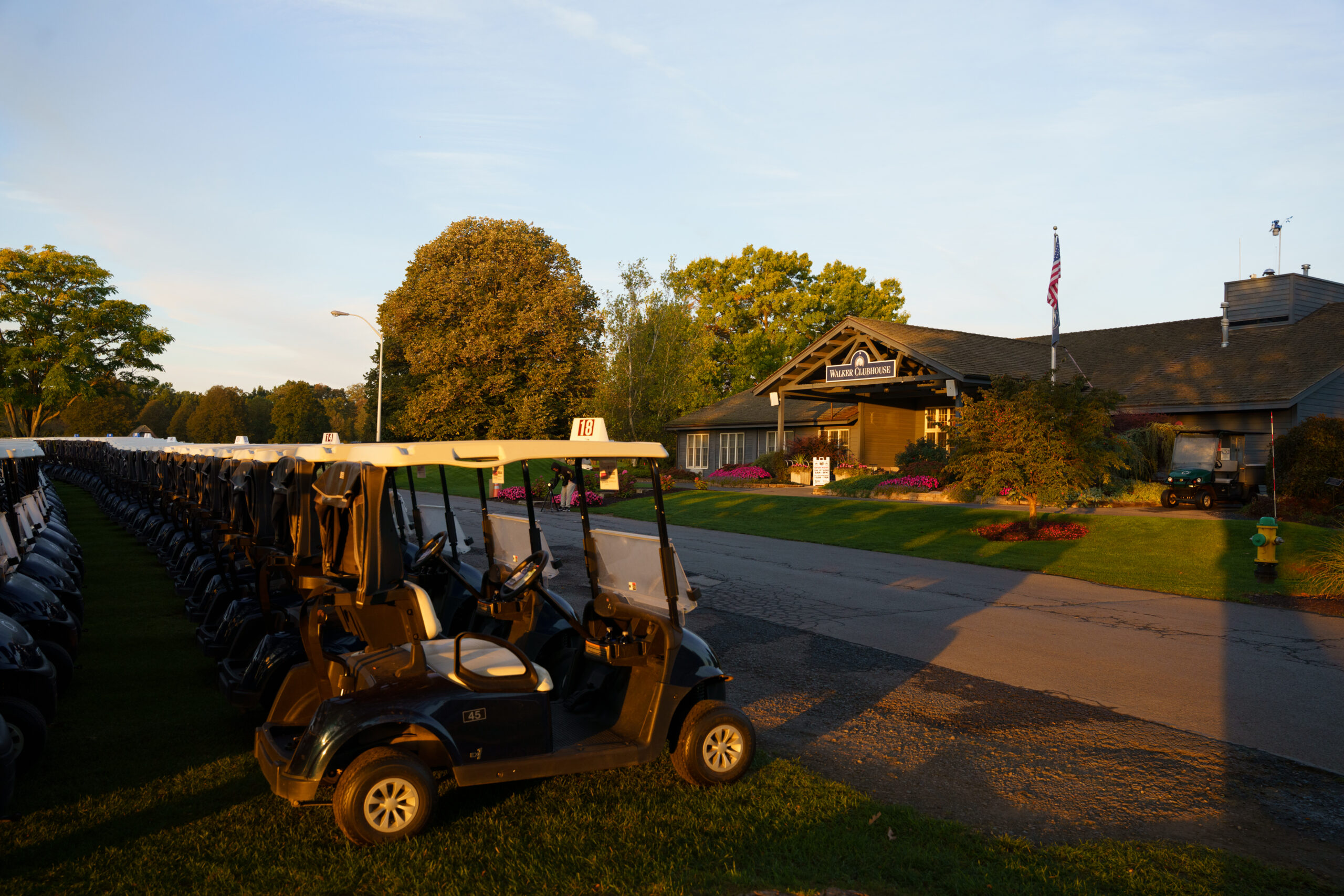 Golf cart on a golf course in the morning